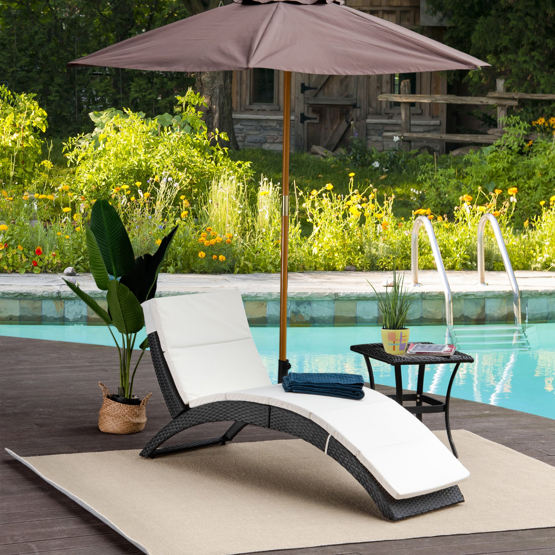 Outsunny Outdoor Foldable PE Rattan Sun Lounger with Soft Padded Cushion