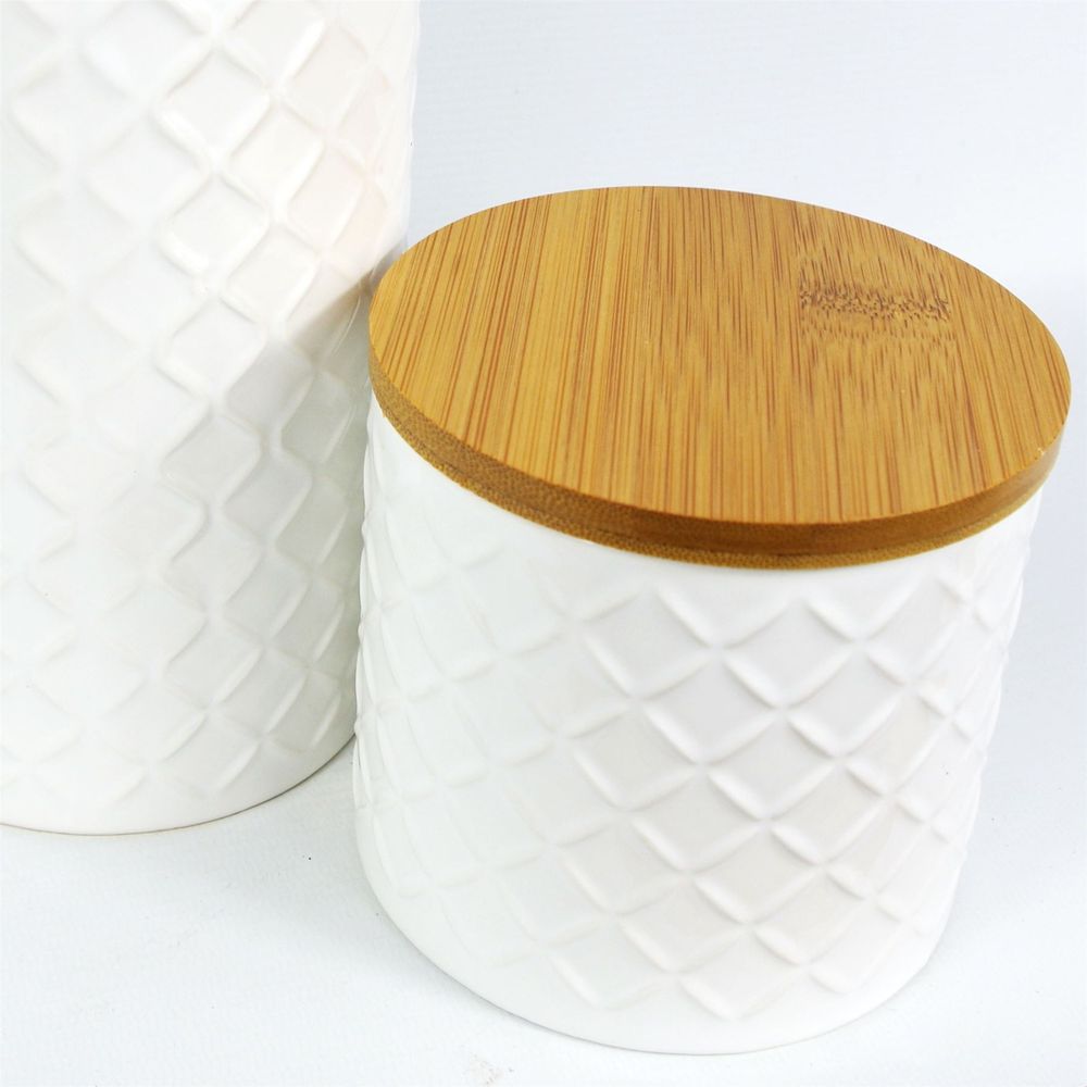 Set of Two Ceramic Jars Embossed Cream Canisters with Lids